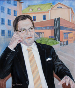 Kuvassa lukion entisen rehtorin Teuvo Rovon maalaus
